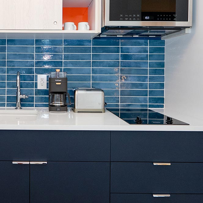 Sunshine Suites Kitchen with Cooktop Detail